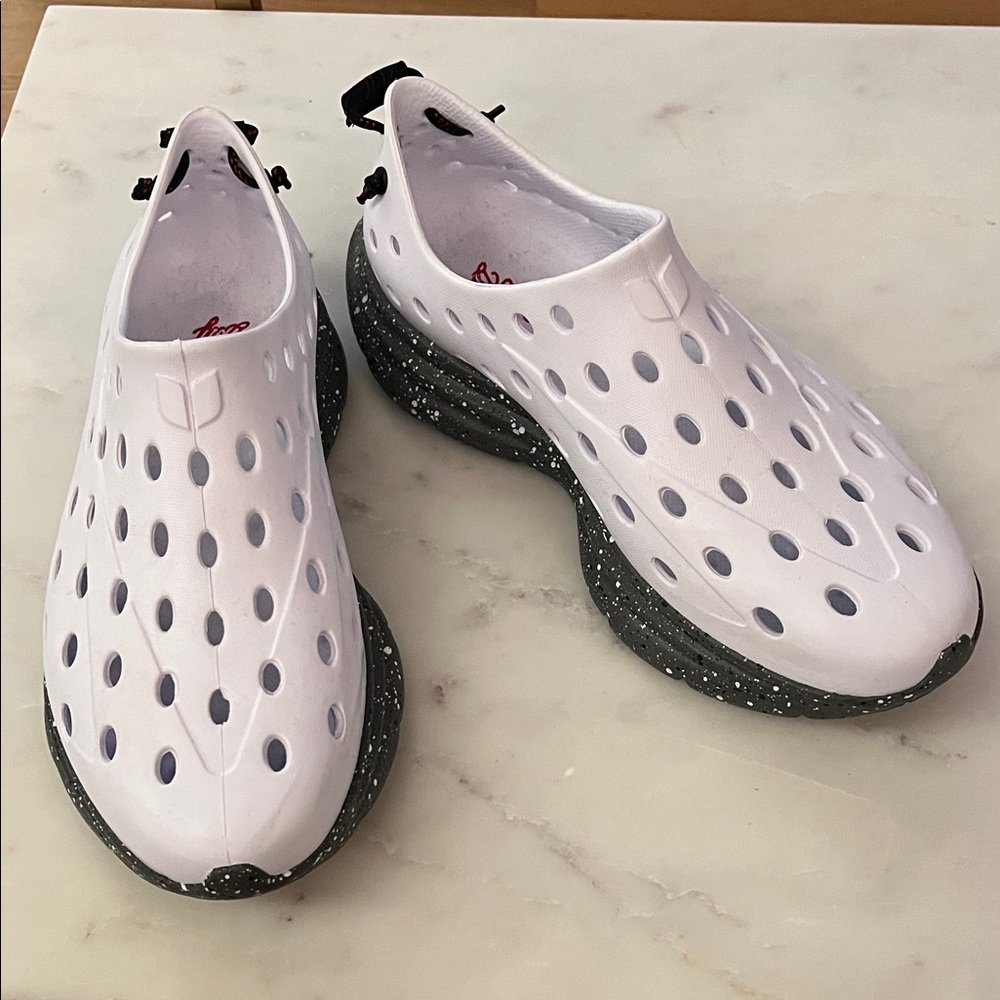 White Slip-On Shoes with Black Speckled Soles